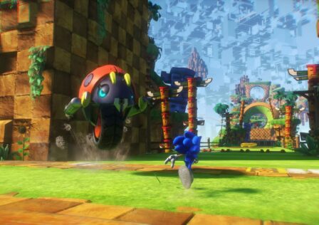 Sonic-Frontiers-Header-Image-where-we-see-sonic-on-a-hige-island-about-to-encounter-a-large-lady-bug-type-enemy-with-a-wheel-under-its-belly-1.jpg