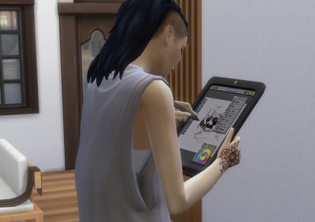 the-sims-4-a-sim-drawing-a-raccoon-on-a-tablet.jpg