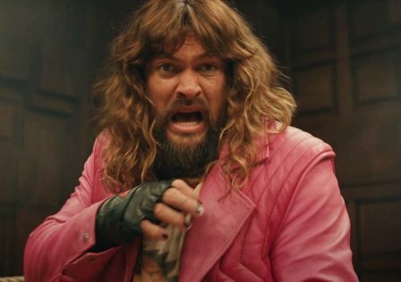 Jason-M-in-A-Minecraft-Movie-wearing-a-pink-jacket-and-standing-in-a-boxing-ring.jpg