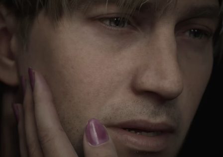 A-person-with-pink-nail-polish-rests-James-face-in-their-hand-in-Silent-Hill-2-Remake.jpg