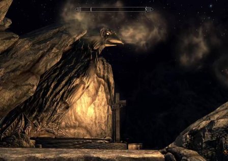 a-statue-overlooks-a-forge-at-night-in-skyrim.jpg