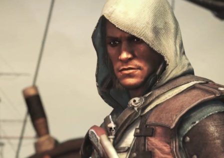 Assassins-Creed-Black-Flag-trailer-screenshot-showing-a-hooded-male-standing-on-a-ship-looking-out-to-sea.jpg