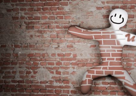 meccha-chameleon-player-hiding-on-a-brick-wall-half-painted-to-match.jpg