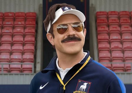 ted-lasso-smiling-in-season-4-promo-stands.jpg