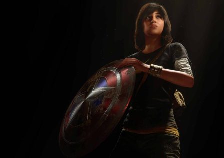 ms-marvel-over-a-black-background-holding-captain-america-s-shield-in-marvel-s-avengers.jpg
