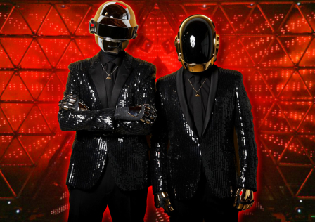 daft-punk-band-members-in-front-of-2007-tour-set.png
