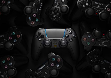 dualsense-surrounded-by-ps2-controllers.jpg
